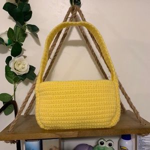 yellow crochet baguette bag